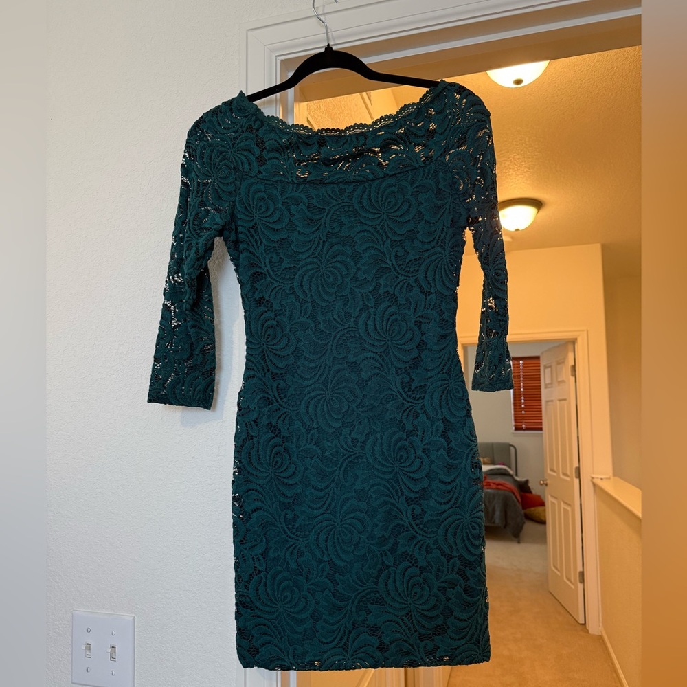 Lace cocktail dress with 3/4 sleeves